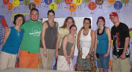 l–r: Margaret Walsh, Sam Wyman, Carleigh Warner, Brenna Donoghue, Katie Weiss, Lia Amante, Becca Lorden, Patrick Davis  Also on the trip, but not in the photo were Eleanor Vander Haegen (Professor Emerita, Sociology) and Tamara Stenn (Adjunct Faculty, Management), John Halter (Budget Analyst, KSC)
