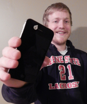 Josh Luft ’10  with his camJAMR-protected smartphone.